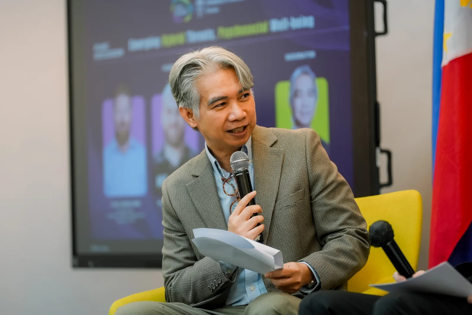 Prof. Manny De Vera, PhD, Academic Program Director of the Master in Development Management at AIM, moderates Panel 3 during the forum.
